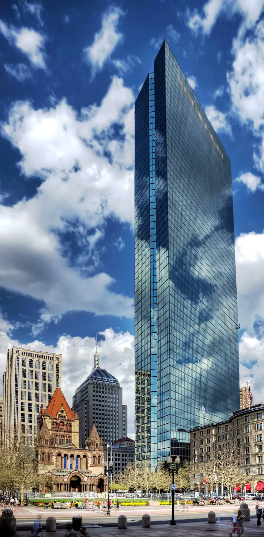Copley Square, Boston: Trinity Church and the Hancock Tower under a bright sky